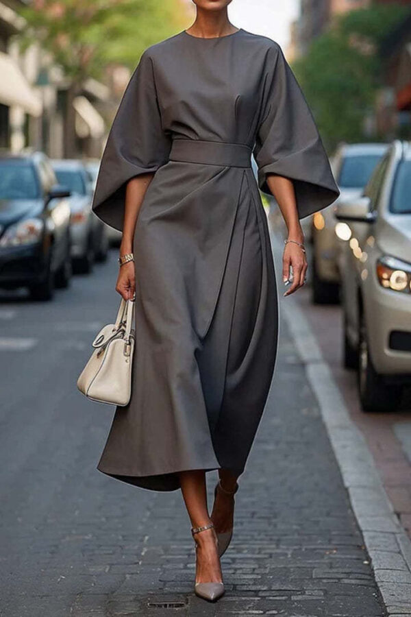 Elegant women's batwing sleeve dress with a waist-tightened silhouette, available in multiple solid colors for a chic and sophisticated look.