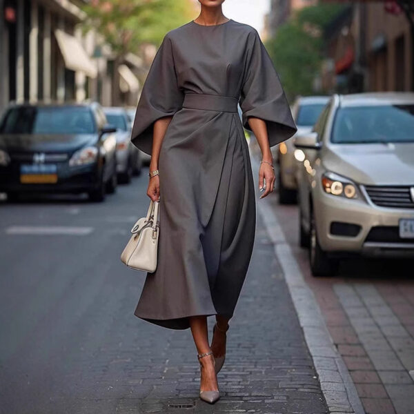 Elegant women's batwing sleeve dress with a waist-tightened silhouette, available in multiple solid colors for a chic and sophisticated look.