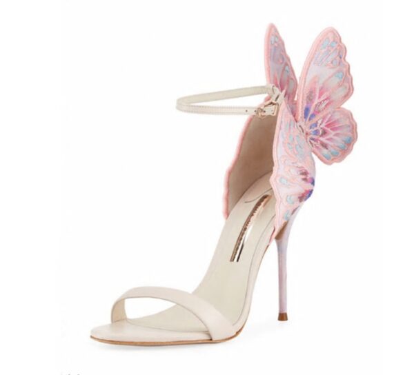 A stylish black stiletto heel sandal with a delicate butterfly wing design at the back, featuring an ankle strap and open-toe style.