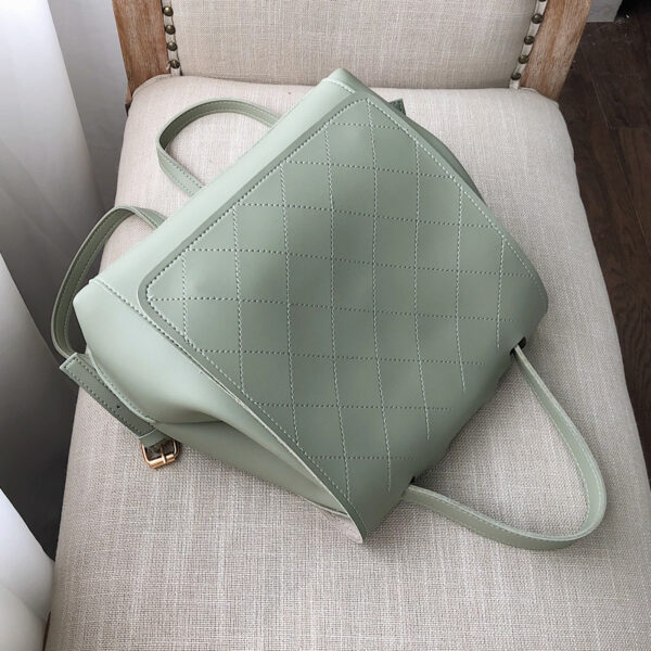 Fashionable quilted backpack with a checked pattern, available in multiple colors, perfect for everyday use.