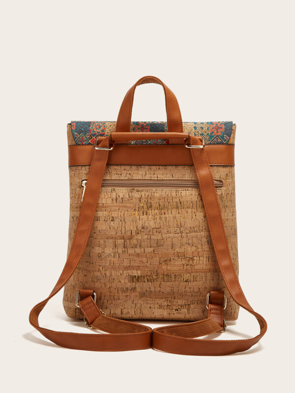 A high-grade fashion backpack featuring a vibrant geometric tile pattern with red, blue, beige, and gold tones.