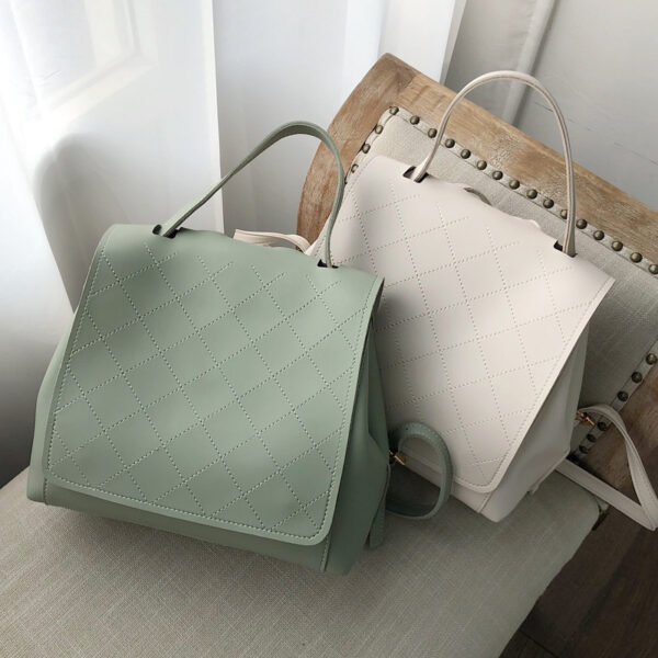 Fashionable quilted backpack with a checked pattern, available in multiple colors, perfect for everyday use.