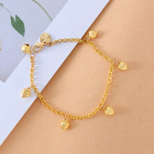 A gold heart charm bracelet with an adjustable chain and delicate heart pendants, perfect for women's fashion jewelry collections.