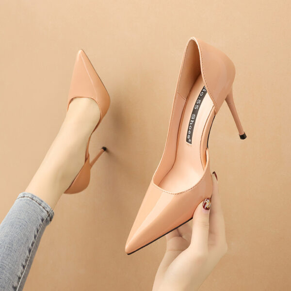 A glossy red pointed-toe stiletto heel with a sleek and elegant design, perfect for formal and evening wear.