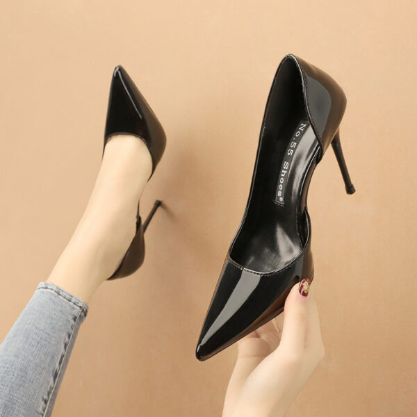 A glossy red pointed-toe stiletto heel with a sleek and elegant design, perfect for formal and evening wear.