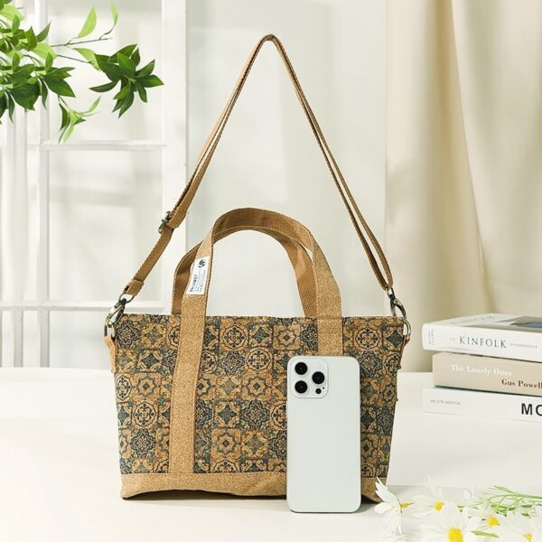 Sustainable cork crossbody bag with an idyllic floral design, featuring an adjustable strap and eco-friendly materials.