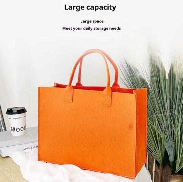 Stylish large capacity felt tote bag in beige, medium gray, and orange with sturdy handles, perfect for shopping and daily use.