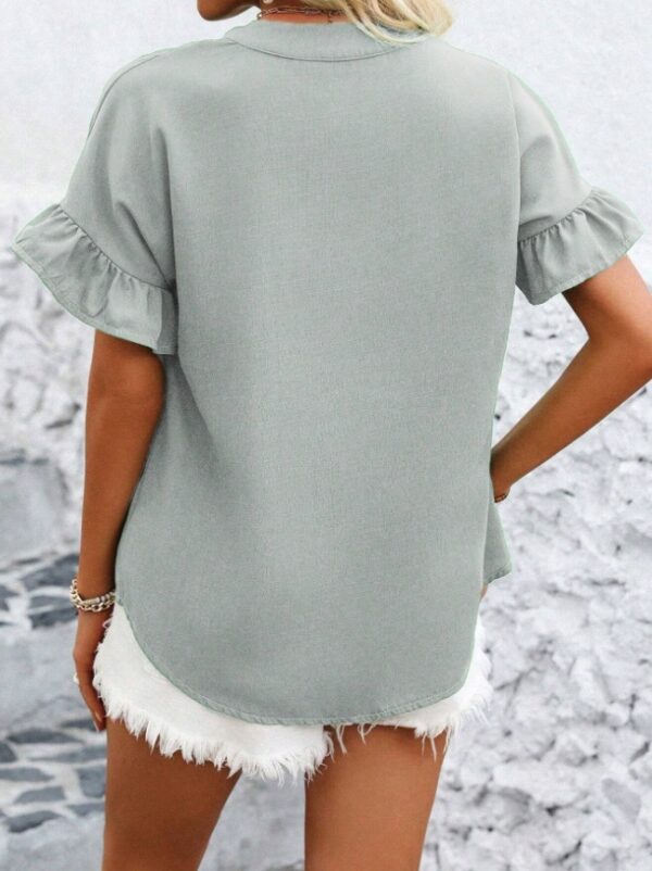 Women's short sleeve solid-color blouse with button-up design, ruffle sleeves, and a relaxed fit for summer comfort.