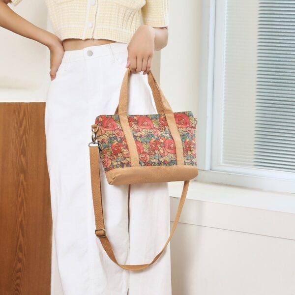 Sustainable cork crossbody bag with an idyllic floral design, featuring an adjustable strap and eco-friendly materials.