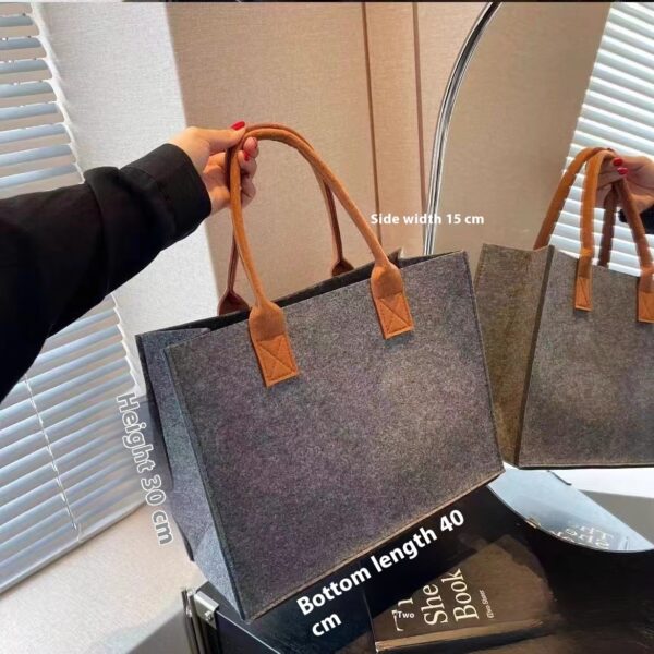Stylish large capacity felt tote bag in beige, medium gray, and orange with sturdy handles, perfect for shopping and daily use.