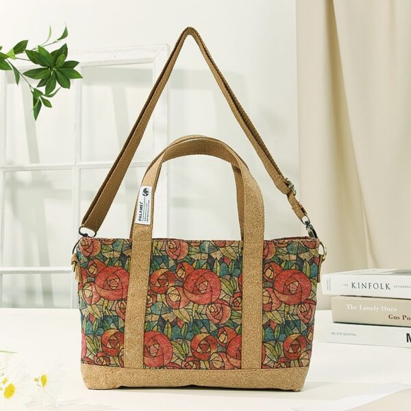 Sustainable cork crossbody bag with an idyllic floral design, featuring an adjustable strap and eco-friendly materials.