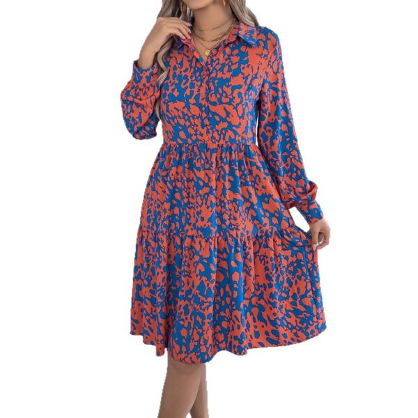 Woman in bold red and blue contrast color leopard print long-sleeved dress