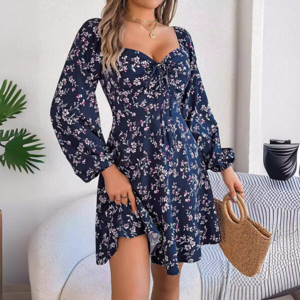 "Multicolor floral mini dress with sweetheart neckline and long puff sleeves in red, green, and navy"