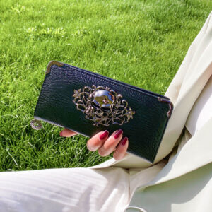 Black gothic skull long wallet for women with multiple card slots and PU leather finish.