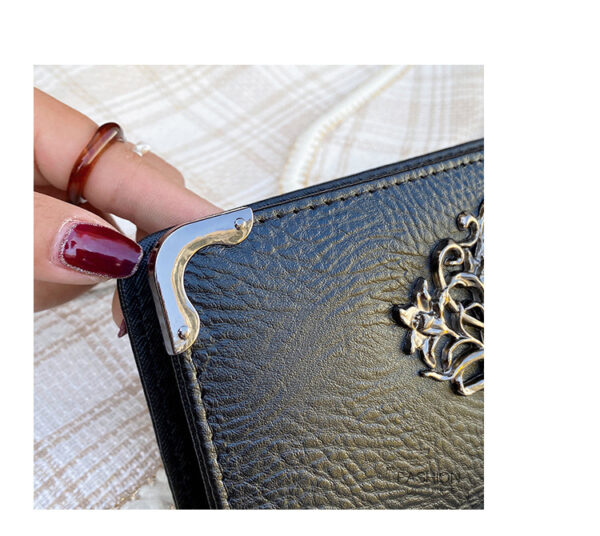 Black gothic skull long wallet for women with multiple card slots and PU leather finish.